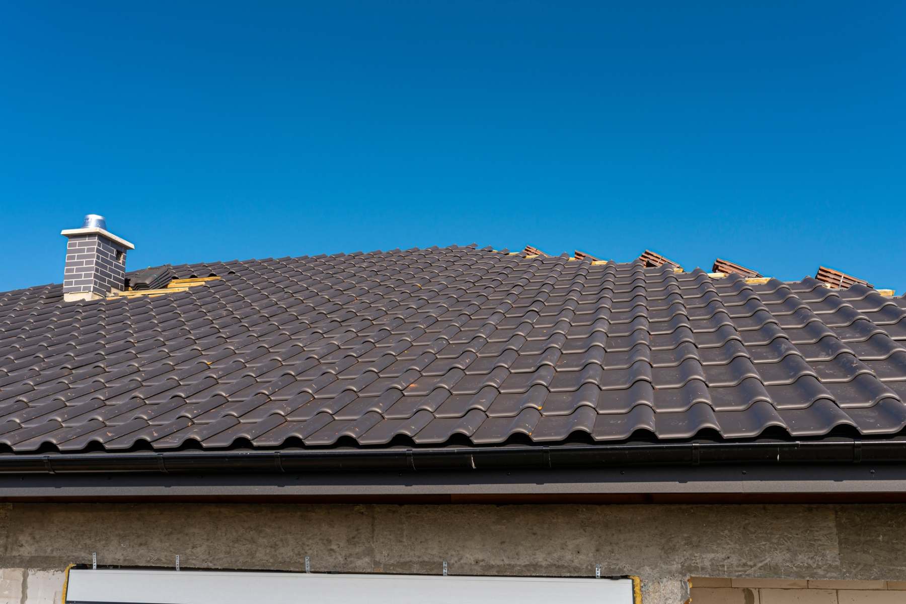 the-roof-of-a-single-family-house-covered-with-a-n-2023-11-27-05-01-06-utc Flat roofing Worthing